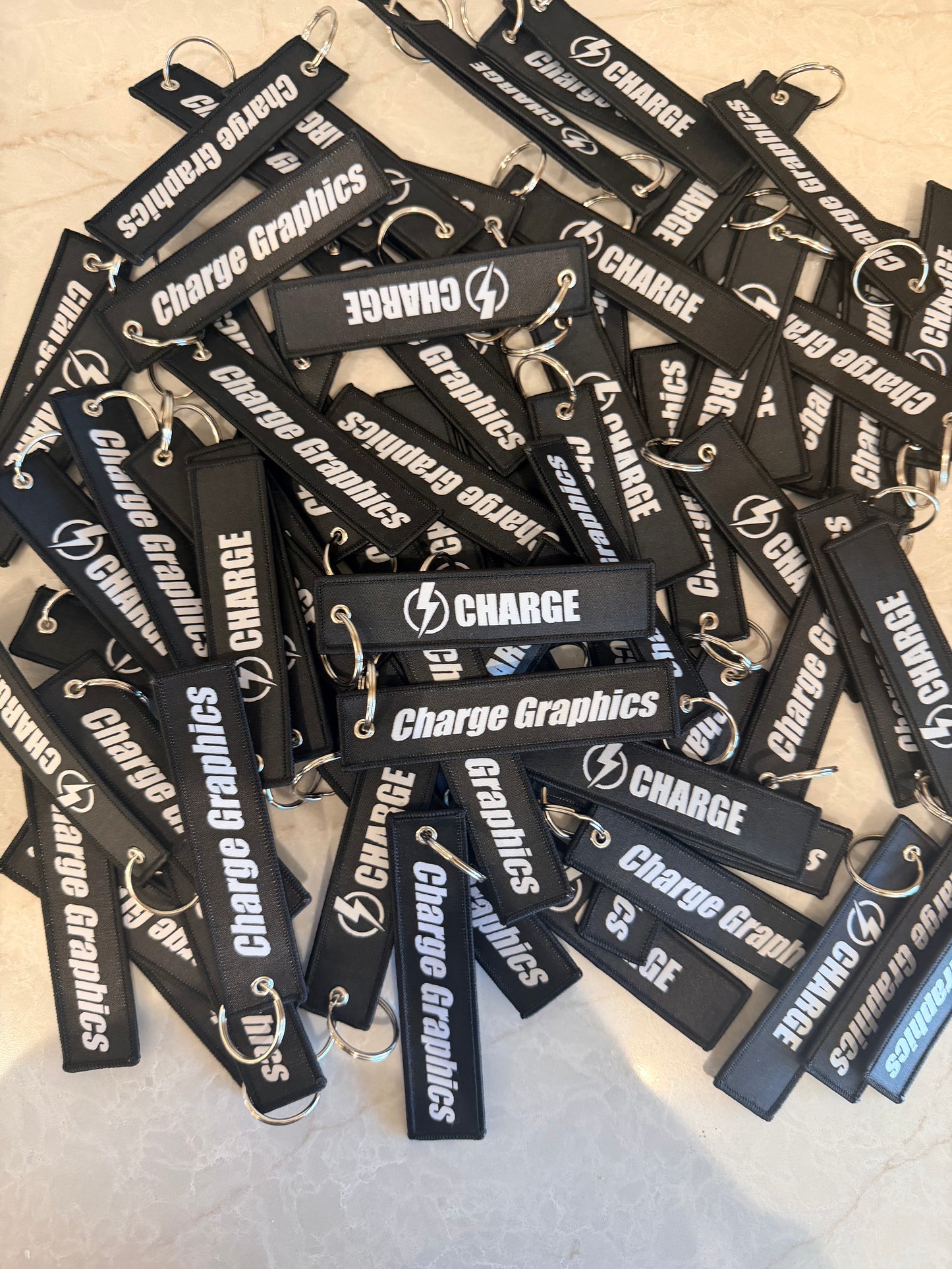 Charge Graphics Keychain